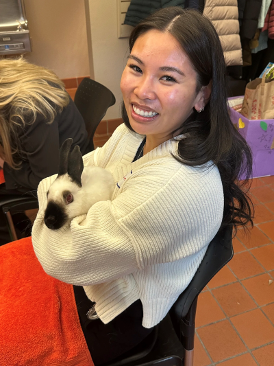 Caroline Raymundo petting bunny