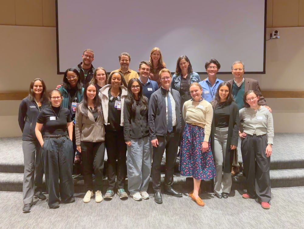 Group photo of faculty and trainees at the lecture
