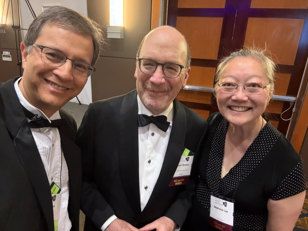 Drs. Paul Nghiem, Bruce Clurman, Executive Vice President, Chief Scientific Officer and Deputy Director of Fred Hutch Cancer Center, Stephanie Lee