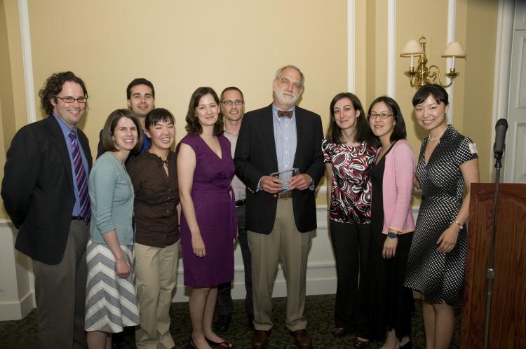 Dr. Fleckman receiving the John E. Olerud Resident Teaching Award in 2009. (l-r) Jay Vary, Jill McKenzie, Edward Esparza, Junko Takeshita, Michi Shinohara, Nic Compton, Phil Fleckman, Zarry Tavvakol, Iwei Yeh, Jing Feng.