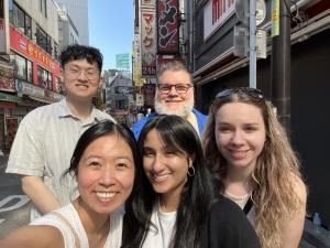 Nghiem Lab members Alex Fu, Emily Huynh, Neha Singh, Erin McClure and her father in Tokyo for the 2023 ISID.