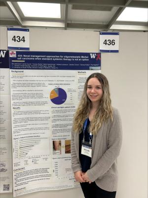 Erin presenting her research at the 2023 ISID.