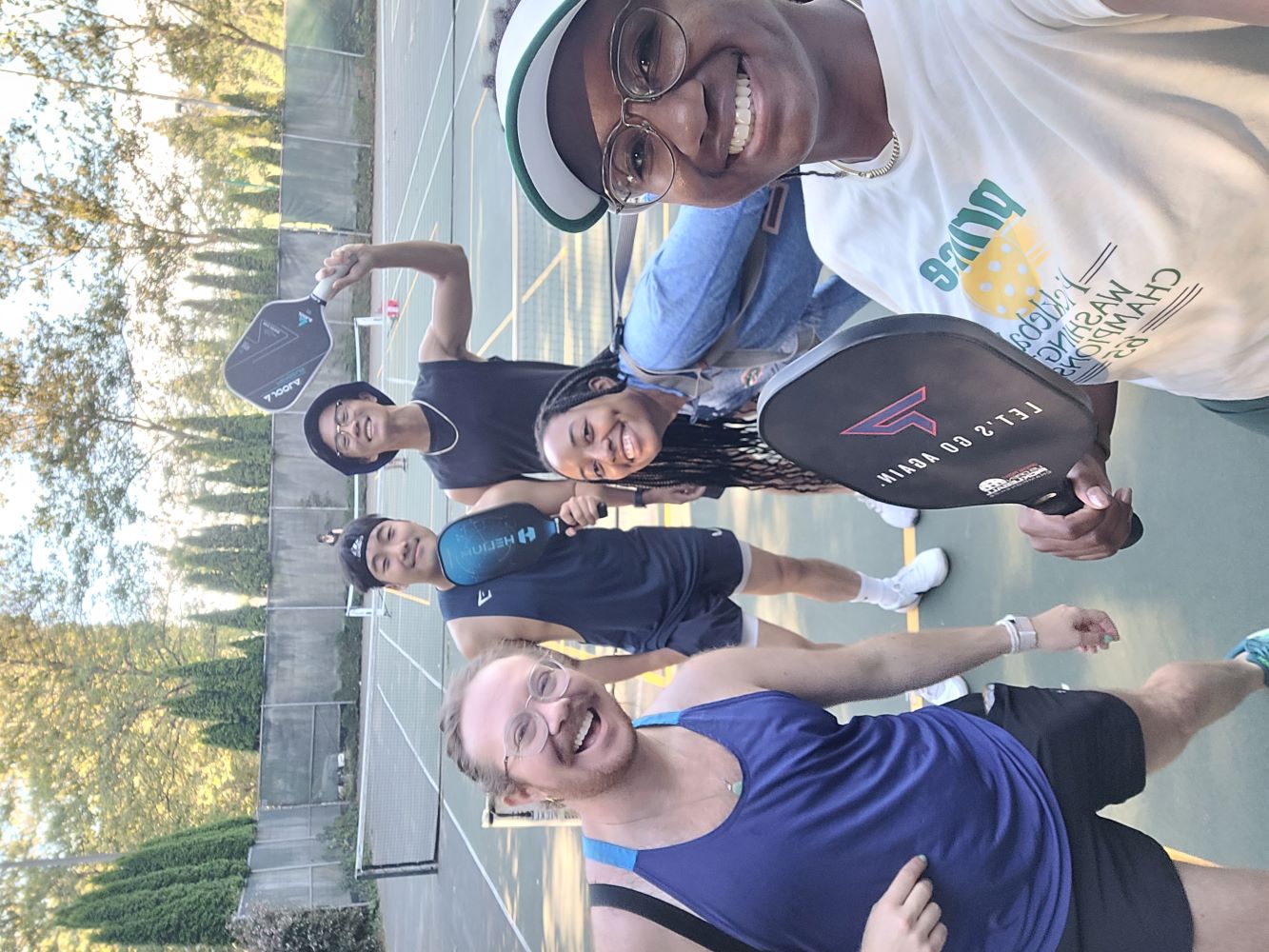 Linda and residents playing tennis