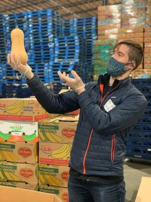 Associate Program Director Dr. Boos admiring all the uses for a simple squash